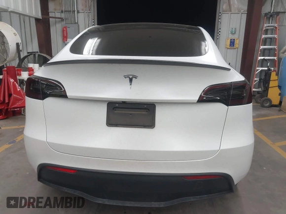 2023 Tesla Model Y Performance with VIN 7SAYGDEF5PF665560, listed as a IAAI auction lot 41809349 with Not Provided miles and . Bid and sale history available at DreamBid. Image 17.