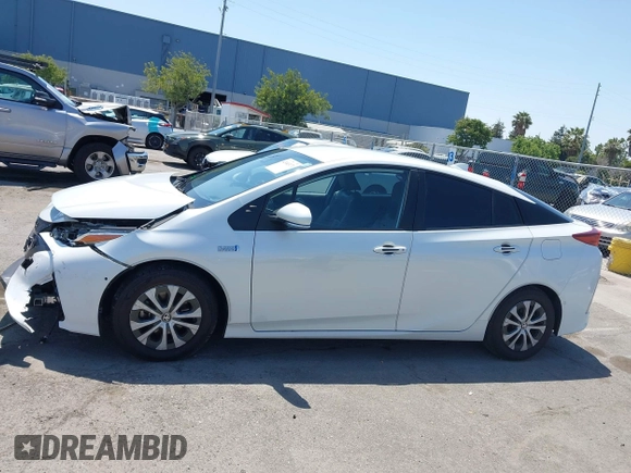2021 Toyota Prius LE z VIN JTDKAMFP3M3187644, wystawiony jako IAAI lot #42443171 z przebiegiem 126 977 mil mil oraz . Historia ofert i sprzedaży dostępna na DreamBid. Obrazek 13.