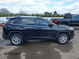 2014 Jeep Cherokee Latitude with VIN 1C4PJMCS6EW219999, listed as a IAAI auction lot 42044695 with 169,533 mi miles and . Bid and sale history available at carsss.com. Image 14.