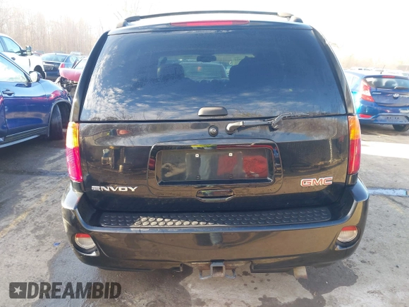 2006 GMC Envoy Denali with VIN 1GKET63M962355586, listed as a IAAI auction lot 41881023 with 235,506 mi miles. Bid and sale history available at carsss.com. Image 16.