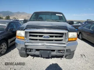 1999 Ford F-250 XL with VIN 1FTNX21L0XED19451, listed as a Copart auction lot 65787795 with 140,812 mi miles and Clean title. Bid and sale history available at DreamBid. Image 5.