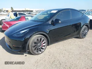 2023 Tesla Model Y Performance with VIN 7SAYGDEF4PF809308, listed as a IAAI auction lot 42056769 with 12,101 mi miles and . Bid and sale history available at DreamBid. Image 18.