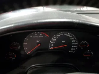 1999 Chevrolet Corvette with VIN 1G1YY12G9X5123877, listed as a Copart auction lot 83972444 with 0 mi miles and Salvage Title. Bid and sale history available at carsss.com. Image 9.