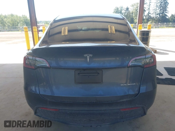 2023 Tesla Model Y Long Range with VIN 7SAYGAEE4PF906577, listed as a IAAI auction lot 42174987 with 13,260 mi miles and . Bid and sale history available at DreamBid. Image 16.