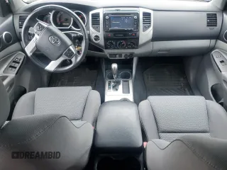 2015 Toyota Tacoma with VIN 3TMLU4EN6FM203591, listed as a Copart auction lot 58518185 with 149,729 mi miles and Salvage title. Bid and sale history available at DreamBid. Image 8.