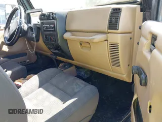 1998 Jeep Wrangler SE with VIN 1J4FY29P5WP793305, listed as a IAAI auction lot 42653372 with 190,047 mi miles and . Bid and sale history available at DreamBid. Image 5.