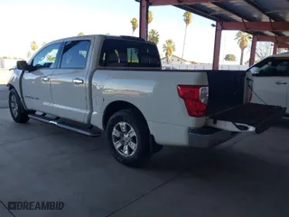 2018 Nissan Titan SV with VIN 1N6AA1EK9JN543043, listed as a IAAI auction lot 41279679 with 49,165 mi miles. Bid and sale history available at carsss.com. Image 3.