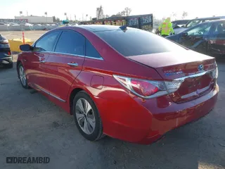 2013 Hyundai Sonata Hybrid Limited with VIN KMHEC4A48DA069570, listed as a IAAI auction lot 41709031 with 173,248 mi miles. Bid and sale history available at carsss.com. Image 3.
