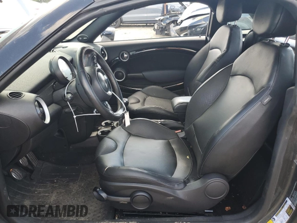 2015 MINI Coupe S z VIN WMWSX3C55FT409449, wystawiony jako Copart lot #66574174 z przebiegiem 99 155 mil mil oraz Szkody całkowita. Historia ofert i sprzedaży dostępna na DreamBid. Obrazek 7.