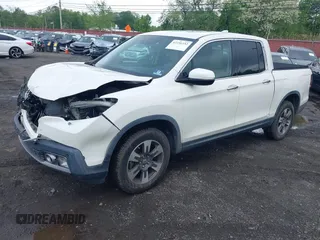 2019 Honda Ridgeline RTL-E with VIN 5FPYK3F75KB020713, listed as a IAAI auction lot 42191152 with 31,245 mi miles and . Bid and sale history available at DreamBid. Image 2.