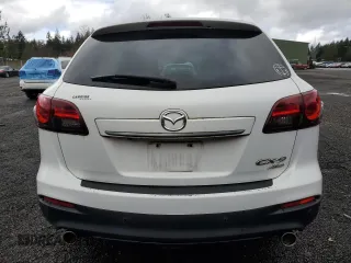 2014 Mazda CX-9 Grand Touring with VIN JM3TB3DV0E0437557, listed as a Copart auction lot 46899435 with 98,525 mi miles and Clean Title. Bid and sale history available at DreamBid. Image 6.