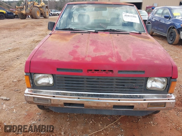 1987 Nissan Hardbody z VIN 1N6ND11S5HC335231, wystawiony jako IAAI lot #41833266 z przebiegiem 199 899 mil mil oraz . Historia ofert i sprzedaży dostępna na DreamBid. Obrazek 6.