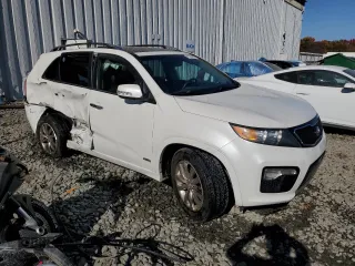 2012 Kia Sorento SX with VIN 5XYKWDA29CG255081, listed as a Copart auction lot 77253214 with 135,156 mi miles and Salvage Title. Bid and sale history available at carsss.com. Image 4.