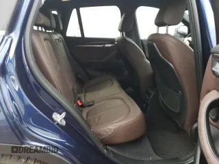 2018 BMW X1 xDrive28i with VIN WBXHT3C35J5F88893, listed as a Copart auction lot 58032725 with 143,968 mi miles and Salvage title. Bid and sale history available at DreamBid. Image 11.