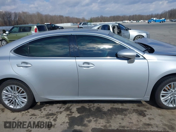 2014 Lexus ES 350 with VIN JTHBK1GG8E2144000, listed as a IAAI auction lot 41642879 with 154,073 mi miles. Bid and sale history available at carsss.com. Image 12.