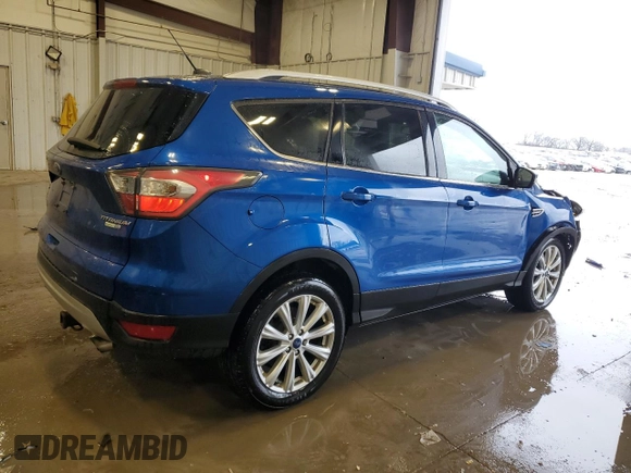 2017 Ford Escape Titanium with VIN 1FMCU9JD2HUB41143, listed as a Copart auction lot 52206015 with 126,277 mi miles and Non Repairable. Bid and sale history available at carsss.com. Image 3.