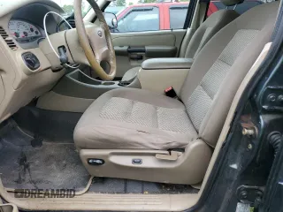 2004 Ford Explorer Sport Trac XLS with VIN 1FMZU67K04UA70503, listed as a Copart auction lot 58214785 with 195,688 mi miles and Salvage title. Bid and sale history available at DreamBid. Image 7.