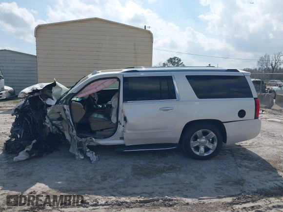 2017 Chevrolet Suburban Premier with VIN 1GNSKJKC0HR288648, listed as a IAAI auction lot 41579677 with Not Provided miles and . Bid and sale history available at DreamBid. Image 13.