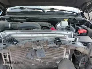 2021 Ram 1500 Lone Star z VIN 1C6RREFT9MN816149, wystawiony jako Copart lot #60498225 z przebiegiem 93 081 mil mil oraz Szkoda całkowita • Salvage title. Historia ofert i sprzedaży dostępna na DreamBid. Obrazek 13.