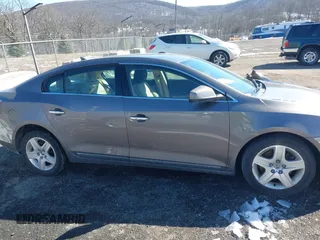2011 Buick LaCrosse CX z VIN 1G4GA5ED7BF287630, wystawiony jako IAAI lot #41585309 z przebiegiem 132 872 mil mil oraz . Historia ofert i sprzedaży dostępna na DreamBid. Obrazek 13.