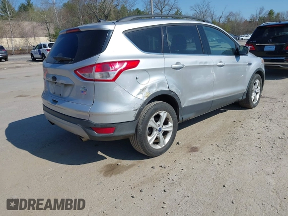 2015 Ford Escape SE with VIN 1FMCU9GX8FUA01774, listed as a IAAI auction lot 42105808 with 119,847 mi miles. Bid and sale history available at carsss.com. Image 4.