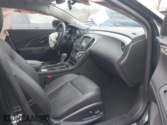 2014 Buick LaCrosse Premium II with VIN 1G4GF5G39EF305104, listed as a IAAI auction lot 41715121 with 81,341 mi miles and . Bid and sale history available at DreamBid. Image 5.
