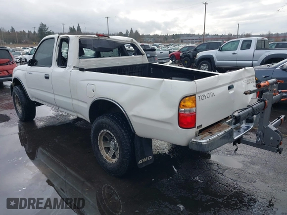 1999 Toyota Tacoma with VIN 4TAWN72N6XZ452890, listed as a IAAI auction lot 41485263 with 201,974 mi miles and . Bid and sale history available at DreamBid. Image 3.