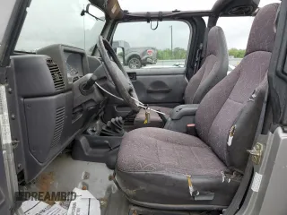 2001 Jeep Wrangler Sport with VIN 1J4FA49S81P348537, listed as a Copart auction lot 52341295 with 131,756 mi miles and Clean Title. Bid and sale history available at carsss.com. Image 7.