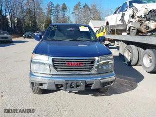 2011 GMC Canyon SLE1 with VIN 1GTH6MFE3B8123808, listed as a IAAI auction lot 41297090 with 142,877 mi miles. Bid and sale history available at carsss.com. Image 12.