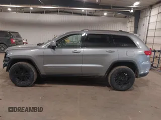 2015 Jeep Grand Cherokee Laredo with VIN 1C4RJFAG4FC797069, listed as a IAAI auction lot 41435299 with 146,755 mi miles. Bid and sale history available at carsss.com. Image 14.