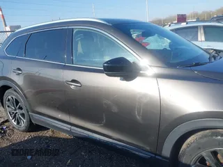 2016 Mazda CX-9 Grand Touring z VIN JM3TCBDY3G0104001, wystawiony jako IAAI lot #41961054 z przebiegiem 77 057 mil mil oraz . Historia ofert i sprzedaży dostępna na DreamBid. Obrazek 13.