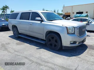 2016 GMC Yukon XL Denali with VIN 1GKS2HKJXGR423556, listed as a IAAI auction lot 42145970 with 118,436 mi miles. Bid and sale history available at carsss.com. Image 1.