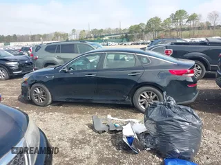 2020 Kia Optima LX z VIN 5XXGT4L31LG418136, wystawiony jako IAAI lot #42048290 z przebiegiem 62 810 mil mil oraz . Historia ofert i sprzedaży dostępna na DreamBid. Obrazek 14.