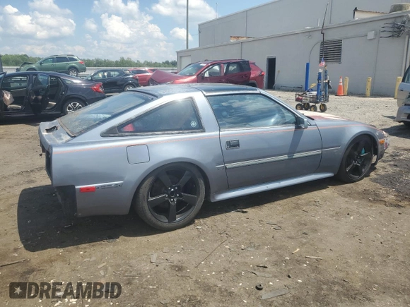 1986 Nissan 300ZX GS z VIN JN1HZ16S2GX095902, wystawiony jako Copart lot #63410585 z przebiegiem 217 539 mil mil oraz Czysty tytuł • Clean title. Historia ofert i sprzedaży dostępna na DreamBid. Obrazek 3.