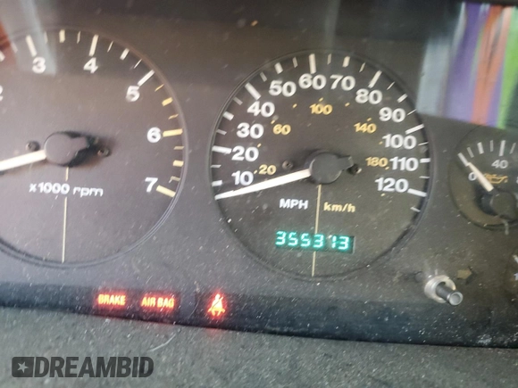1997 Jeep Grand Cherokee TSi with VIN 1J4FX58SXVC565347, listed as a Copart auction lot 80953334 with 355,373 mi miles and Salvage Title. Bid and sale history available at carsss.com. Image 9.
