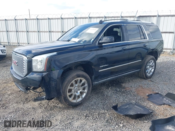 2015 GMC Yukon Denali with VIN 1GKS1CKJ8FR612971, listed as a IAAI auction lot 41519689 with 197,003 mi miles. Bid and sale history available at carsss.com. Image 17.