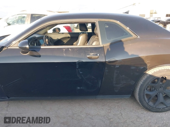2016 Dodge Challenger SXT Plus z VIN 2C3CDZAG5GH345617, wystawiony jako IAAI lot #40801879 z przebiegiem 94 610 mil mil oraz . Historia ofert i sprzedaży dostępna na DreamBid. Obrazek 14.