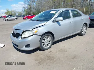 2009 Toyota Corolla with VIN 2T1BU40E69C142856, listed as a IAAI auction lot 42045414 with 238,154 mi miles. Bid and sale history available at carsss.com. Image 2.