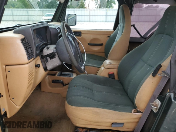 1998 Jeep Wrangler Sahara с VIN 1J4FY49S0WP727745, выставлен на аукционе Copart как лот 60546955 с пробегом 139 476 миль миль и Чистый • Clean title. История ставок и продаж доступна на DreamBid. Изображение 7.