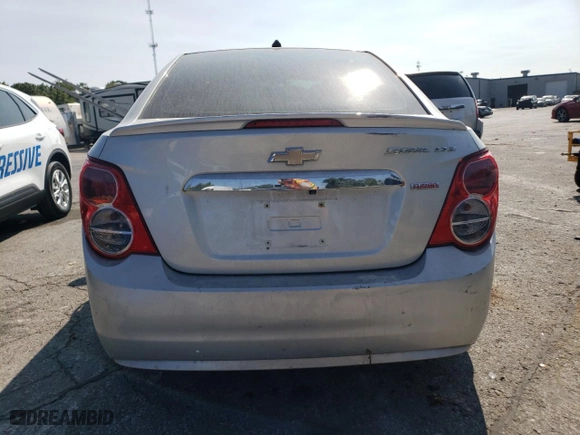 2014 Chevrolet Sonic LTZ with VIN 1G1JE5SB6E4215697, listed as a Copart auction lot 70820024 with 166,414 mi miles and Salvage Title. Bid and sale history available at carsss.com. Image 6.