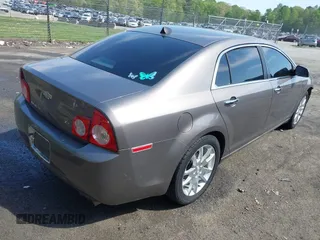 2012 Chevrolet Malibu LTZ with VIN 1G1ZG5E78CF298359, listed as a IAAI auction lot 42022284 with 141,295 mi miles and . Bid and sale history available at DreamBid. Image 4.
