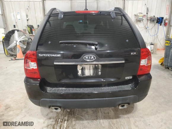 2009 Kia Sportage LX with VIN KNDJF723197638667, listed as a Copart auction lot 82926774 with 196,752 mi miles and Clean Title. Bid and sale history available at carsss.com. Image 6.