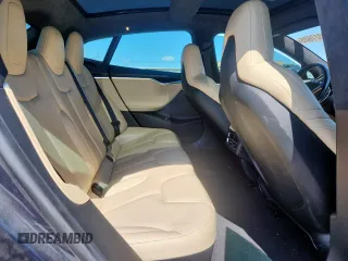2016 Tesla Model S 90D z VIN 5YJSA1E40GF145137, wystawiony jako Copart lot #62027605 z przebiegiem 92 060 mil mil oraz Szkoda całkowita • Salvage title. Historia ofert i sprzedaży dostępna na DreamBid. Obrazek 10.