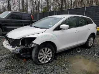 2011 Mazda CX-7 i SV z VIN JM3ER2A51B0380347, wystawiony jako Copart lot #50992345 z przebiegiem 141 713 mil mil oraz Nie do naprawy • Non repairable. Historia ofert i sprzedaży dostępna na DreamBid. Obrazek 1.