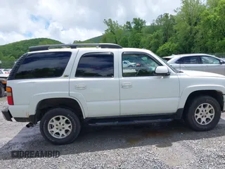 2003 Chevrolet Tahoe Z71 z VIN 1GNEK13Z23R230226, wystawiony jako IAAI lot #42252874 z przebiegiem 251 268 mil mil oraz . Historia ofert i sprzedaży dostępna na DreamBid. Obrazek 13.