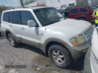 2002 Mitsubishi Montero Limited z VIN JA4MW51RX2J004459, wystawiony jako IAAI lot #41963113 z przebiegiem 212 764 mil mil oraz . Historia ofert i sprzedaży dostępna na DreamBid. Obrazek 1.