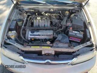 1999 Nissan Maxima GXE z VIN JN1CA21D8XM403253, wystawiony jako Copart lot #55877675 z przebiegiem 61 019 mil mil oraz Czysty tytuł • Clean title. Historia ofert i sprzedaży dostępna na DreamBid. Obrazek 11.