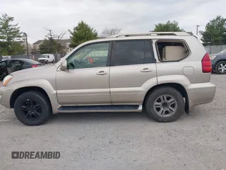 2003 Lexus GX 470 z VIN JTJBT20X230003105, wystawiony jako IAAI lot #42063855 z przebiegiem 204 004 mil mil oraz . Historia ofert i sprzedaży dostępna na DreamBid. Obrazek 14.