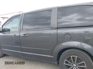2015 Dodge Grand Caravan American Value with VIN 2C4RDGBG2FR542844, listed as a IAAI auction lot 42109983 with 129,718 mi miles and . Bid and sale history available at DreamBid. Image 14.