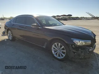 2018 BMW 7 Series 740i with VIN WBA7E2C55JG742497, listed as a Copart auction lot 82173994 with 52,354 mi miles and Salvage Title. Bid and sale history available at carsss.com. Image 4.